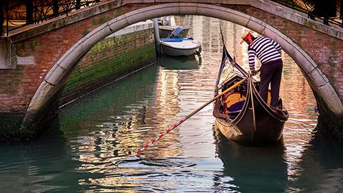 Water way in Venice, Italy with small boat