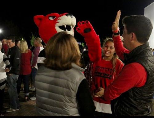 Pouncer celebrates with fans at Flashback Friday