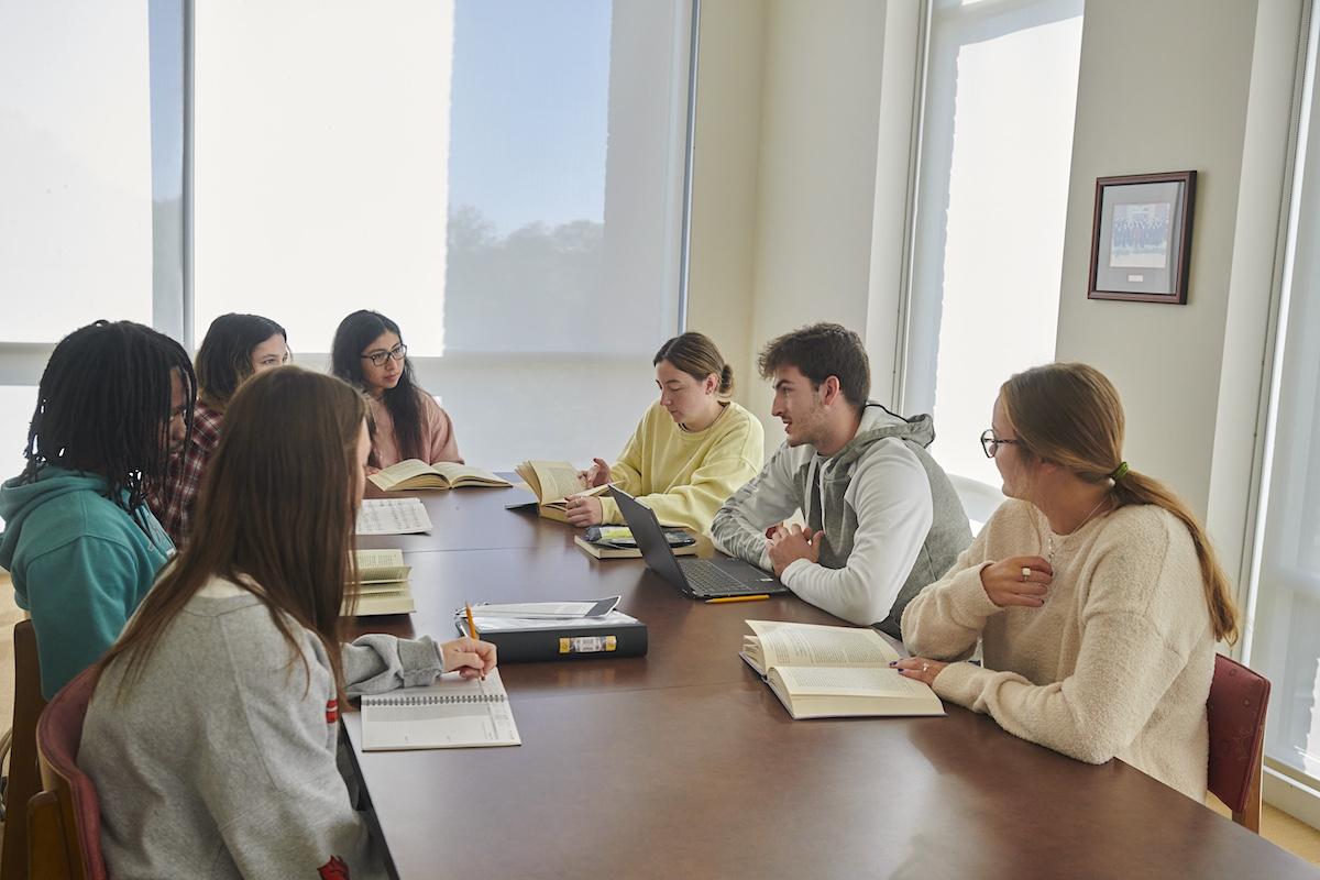 Students attending a meeting